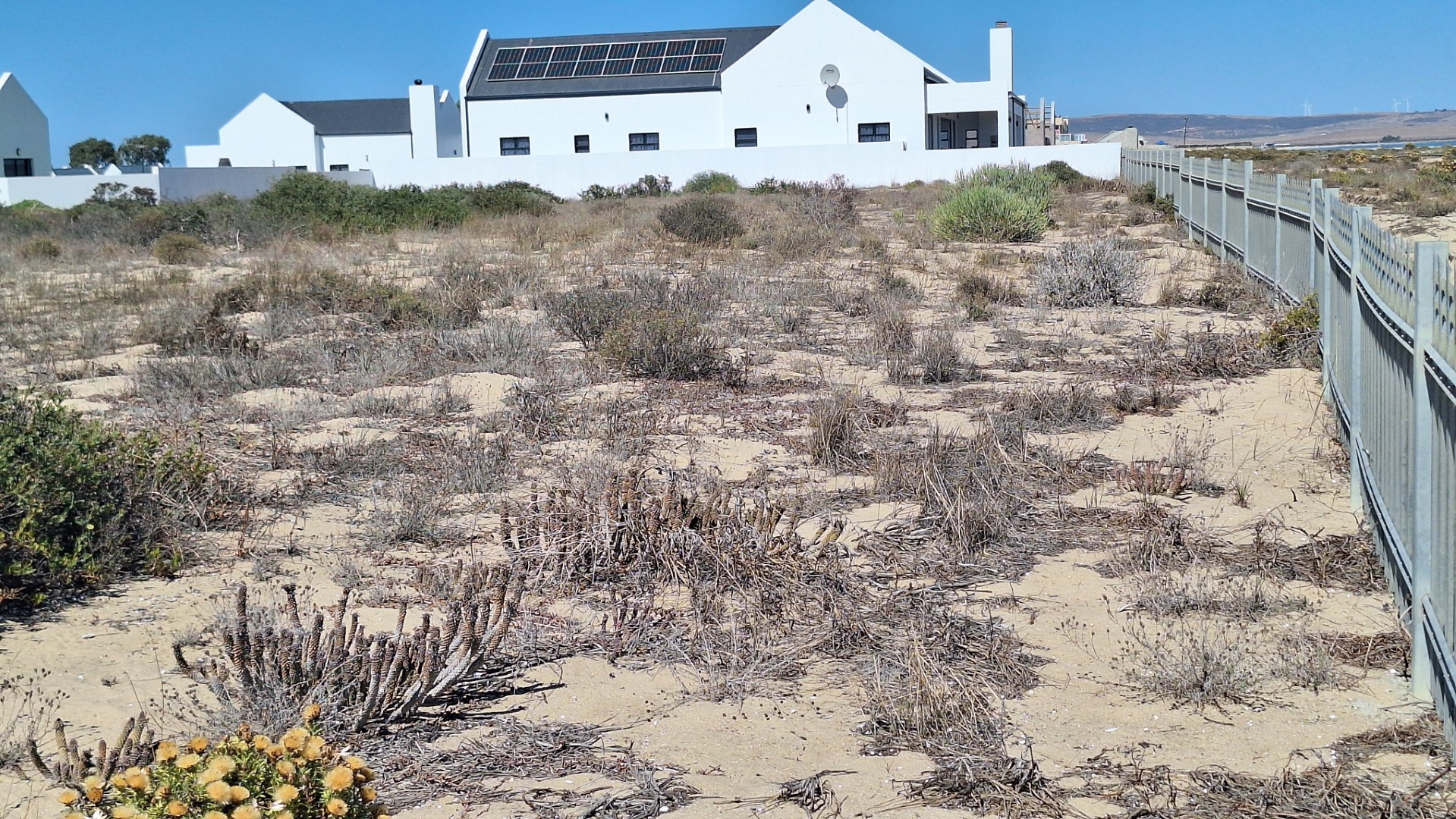 Exquisite Beachfront Sea-View Plot in Secure Estate