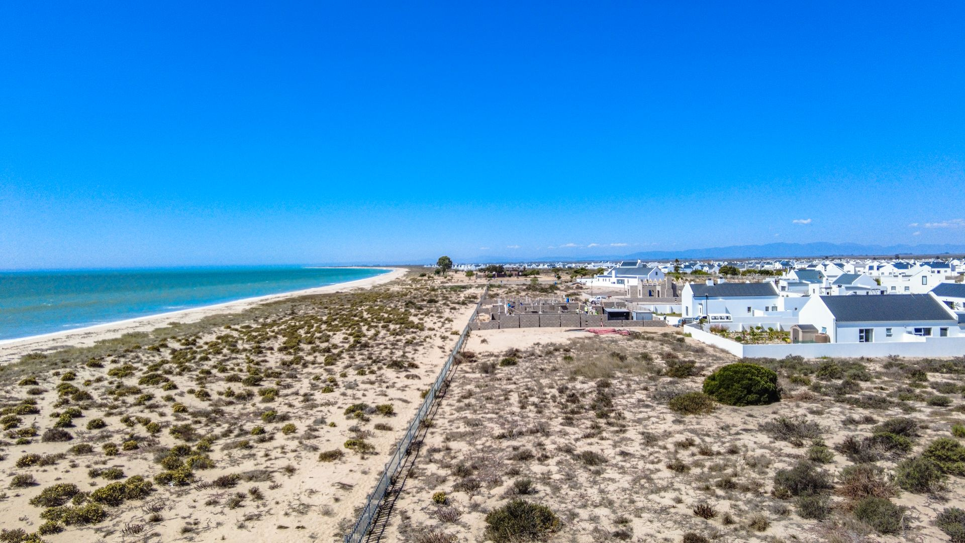 Exquisite Beachfront Sea-View Plot in Secure Estate