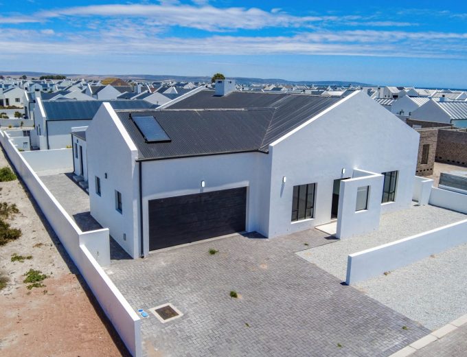 Modern Coastal Home with Separate Guest Suite in Secure Estate