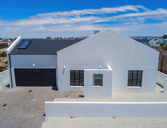 Modern Coastal Home with Separate Guest Suite in Secure Estate