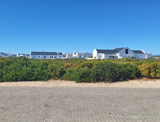 Modern Coastal Home with Separate Guest Suite in Secure Estate