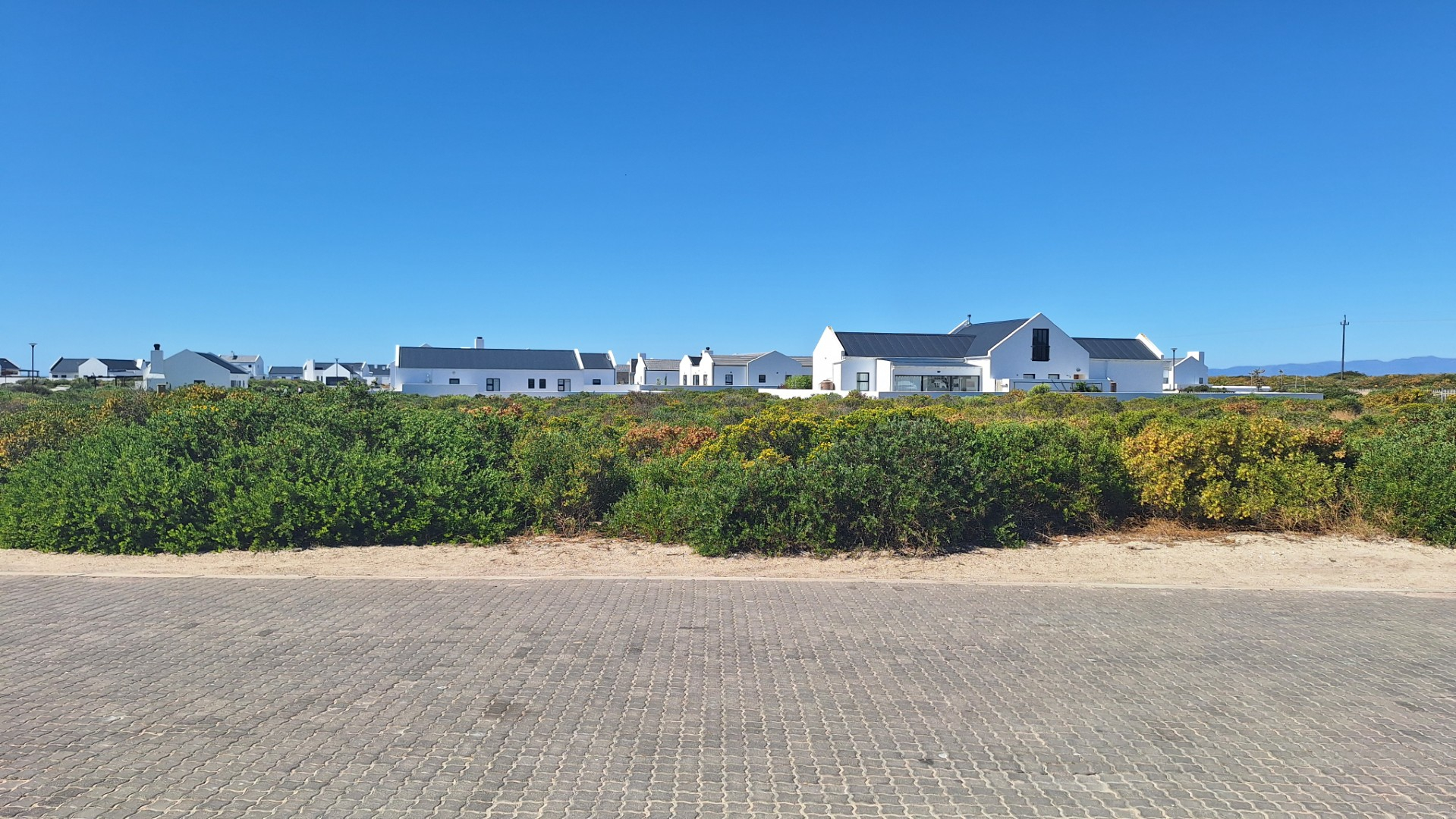 Modern Coastal Home with Separate Guest Suite in Secure Estate