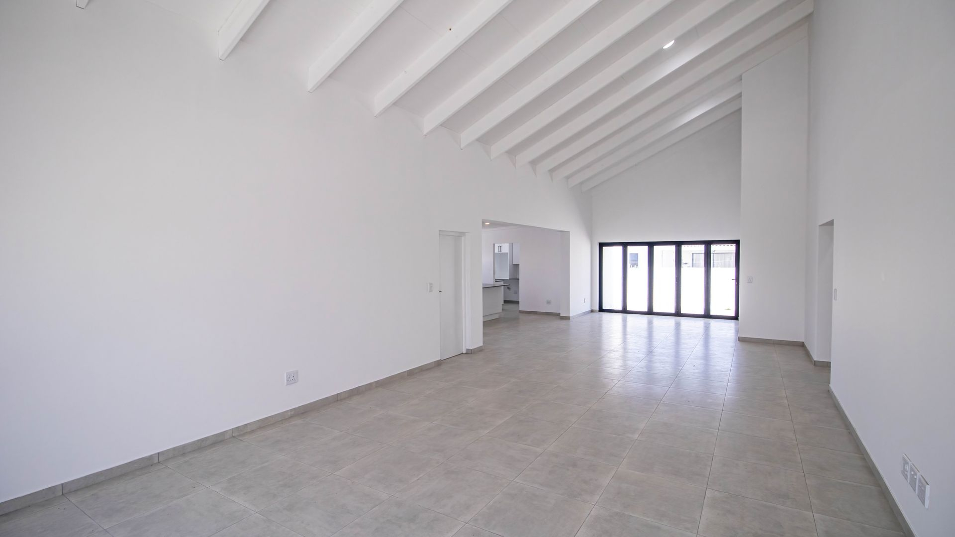 Modern Coastal Home with Separate Guest Suite in Secure Estate