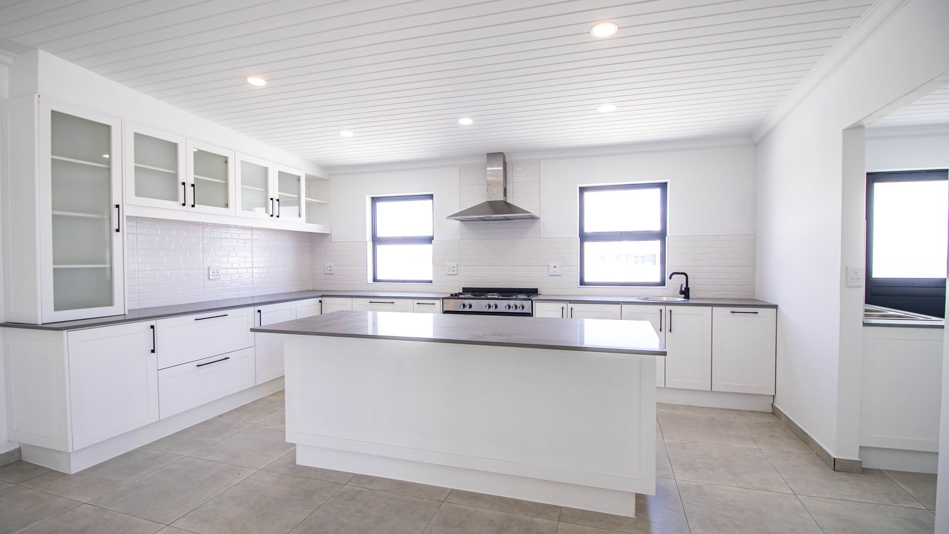 Modern Coastal Home with Separate Guest Suite in Secure Estate