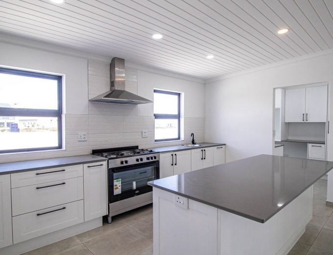 Modern Coastal Home with Separate Guest Suite in Secure Estate