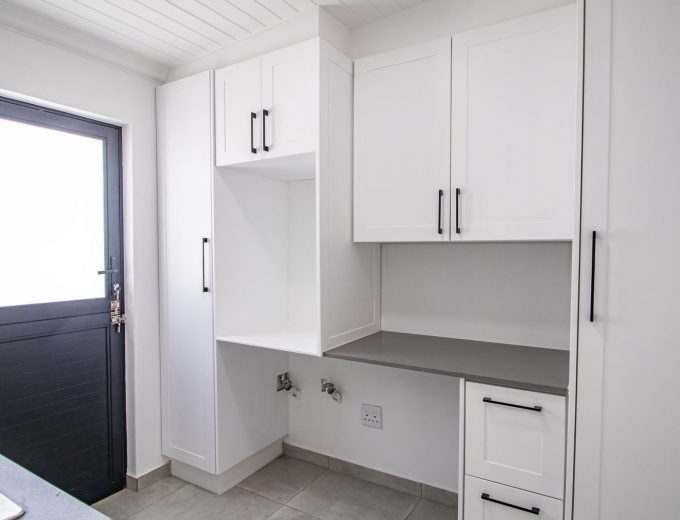 Modern Coastal Home with Separate Guest Suite in Secure Estate