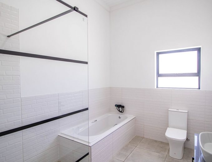 Modern Coastal Home with Separate Guest Suite in Secure Estate