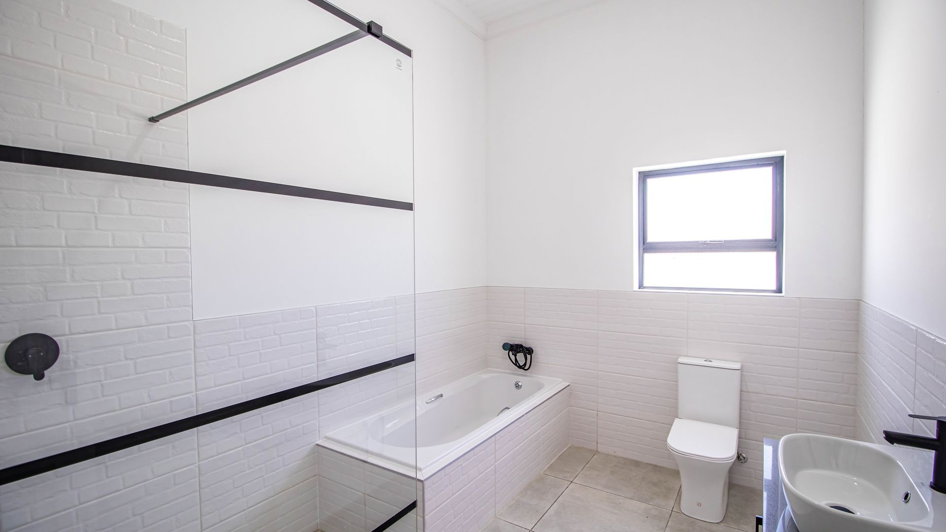 Modern Coastal Home with Separate Guest Suite in Secure Estate