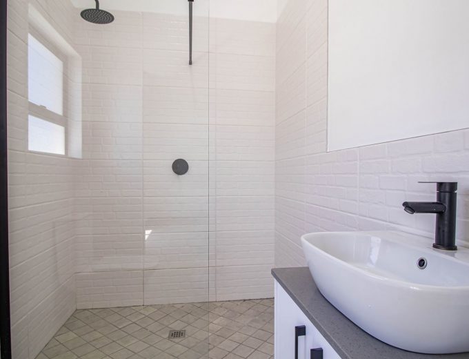 Modern Coastal Home with Separate Guest Suite in Secure Estate