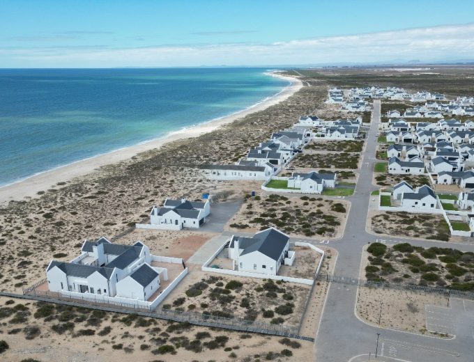 Modern Coastal Home with Separate Guest Suite in Secure Estate