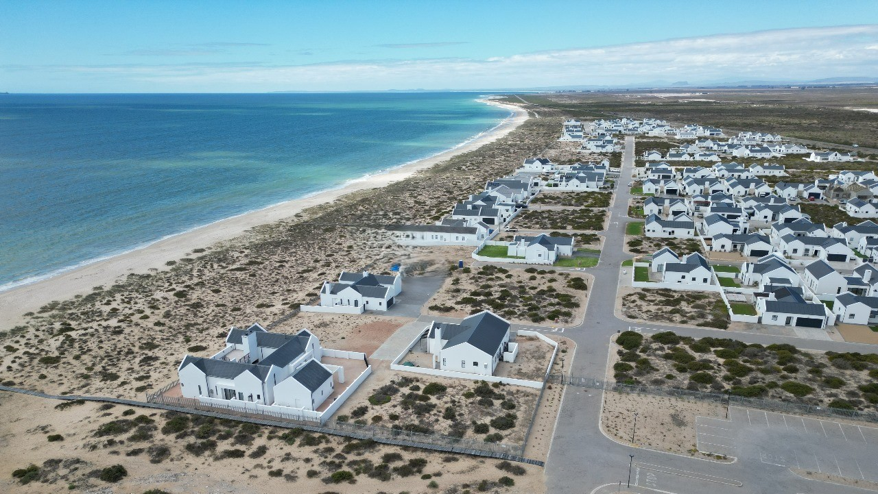 Modern Coastal Home with Separate Guest Suite in Secure Estate