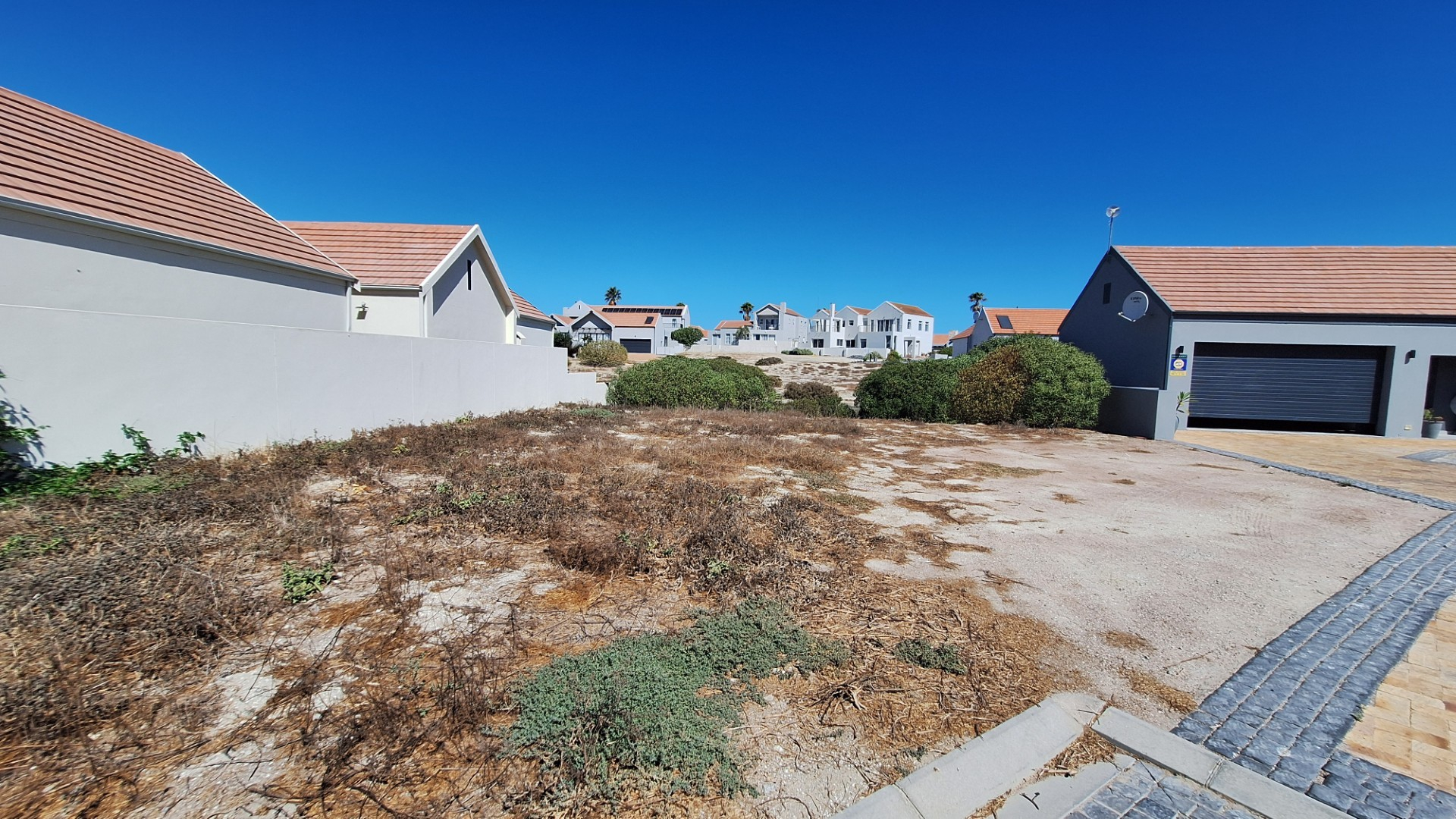 Sought-After Plot with Shared Jetty Rights in Small Secure Complex