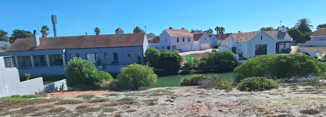 Sought-After Plot with Shared Jetty Rights in Small Secure Complex